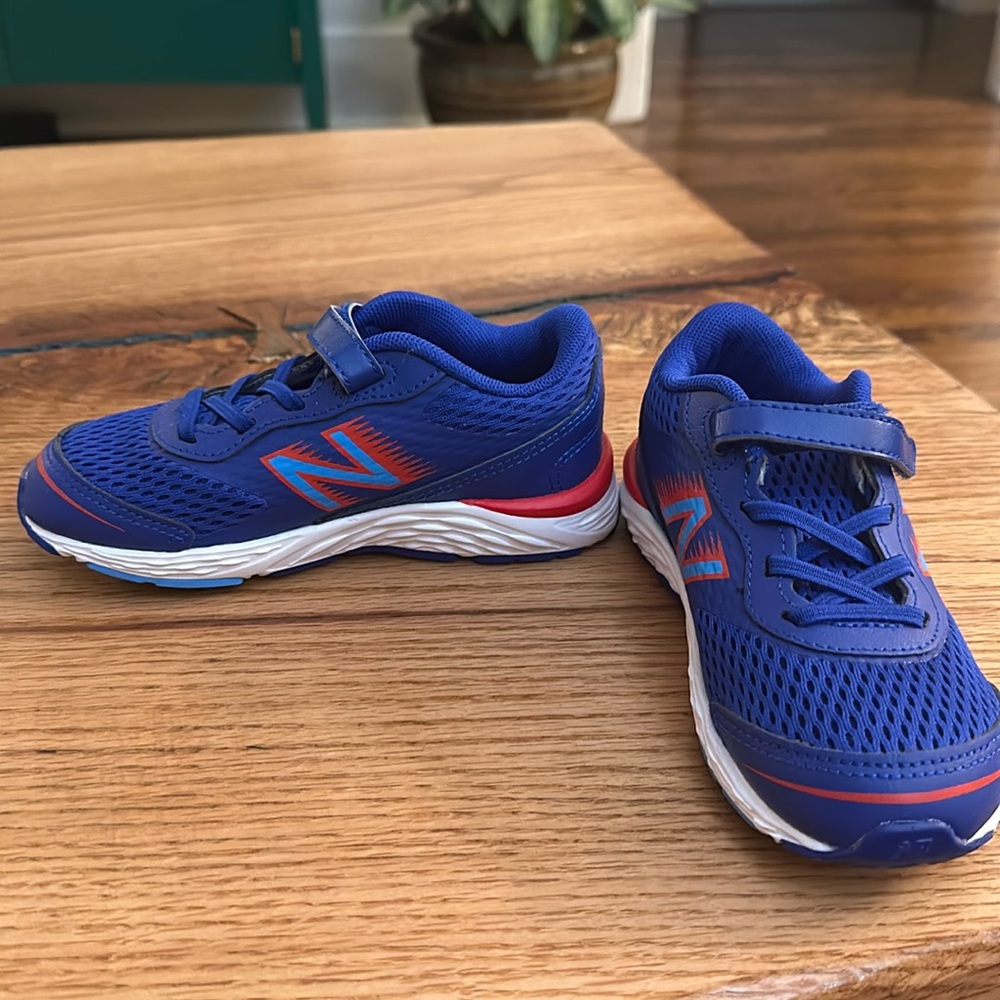 Never been worn boys size 10 New Balance sneakers